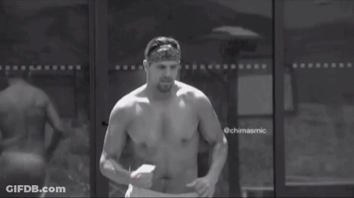 Shirtless Man Running In Front Of Glass Door GIF
