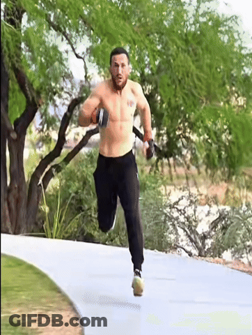Shirtless Man Running On Path With Trees GIF