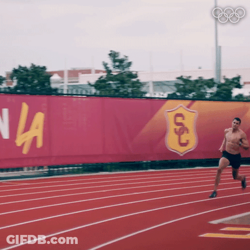 Shirtless Man Running On Track GIF