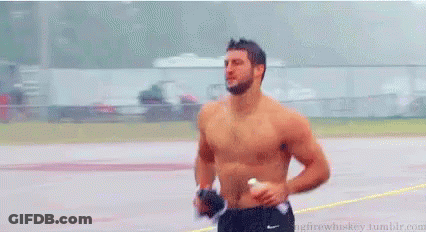 Shirtless Man Running On Track With Glove GIF