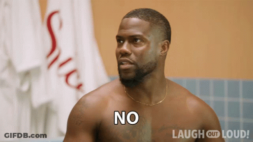 Shirtless Man Says No In Front Of Towels GIF