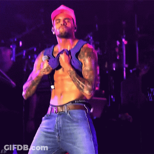 Shirtless Man Singing Into Microphone GIF