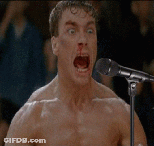 Shirtless Man Singing Into Microphone GIF