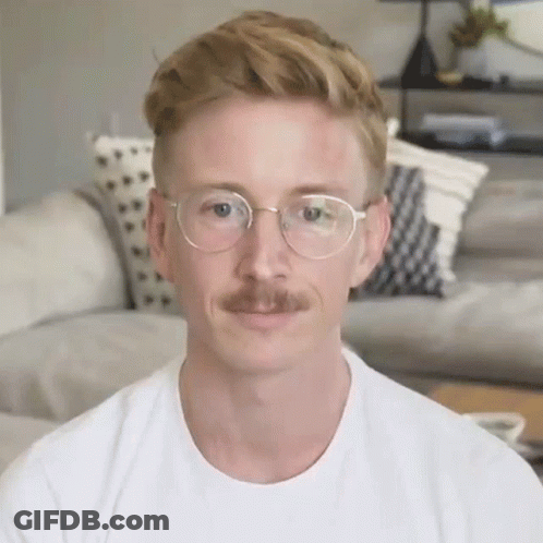 Shirtless Man Singing Into Microphone GIF