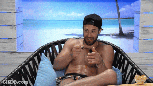 Shirtless Man Sitting In Wicker Chair With Beach Scene GIF