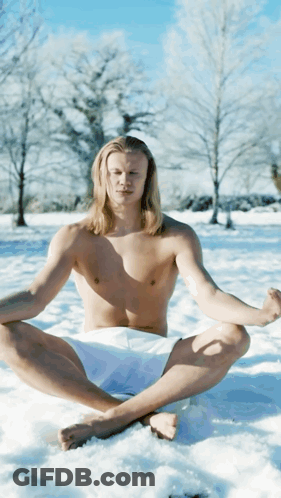 Shirtless Man Sitting Lotus In Snow GIF