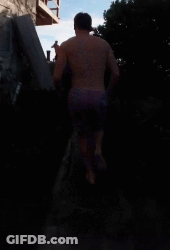 Shirtless Man Sitting On Bench GIF
