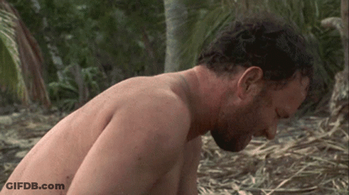Shirtless Man Sitting On Ground GIF