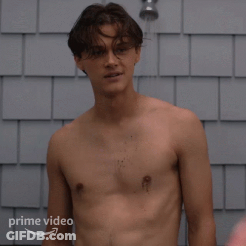 Shirtless Man Smiling In Shower With Prime Video Logo GIF
