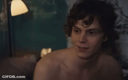 Shirtless Man Smiling On Bed GIF