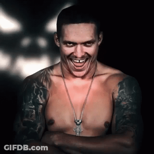 Shirtless Man Smiling With Cross Necklace GIF