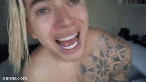 Shirtless Man Smiling With Tattoo GIF