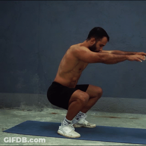 Shirtless Man Squatting On Yoga Mat GIF