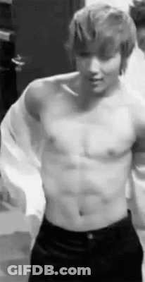 Shirtless Man Standing Arms Outstretched GIF