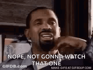 Shirtless Man Standing At Window Hands On Hips GIF