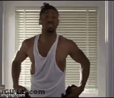 Shirtless Man Standing At Window Hands On Hips GIF