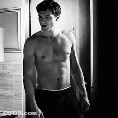 Shirtless Man Standing In Bathroom GIF