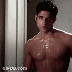 Shirtless Man Standing In Bathroom Door GIF