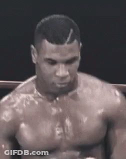 Shirtless Man Standing In Boxing Ring GIF