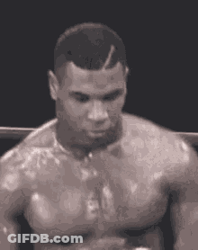 Shirtless Man Standing In Boxing Ring GIF