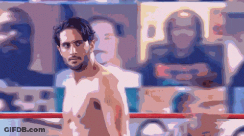 Shirtless Man Standing In Boxing Ring GIF