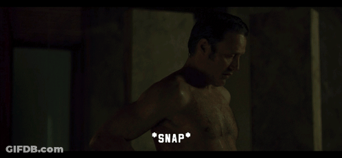 Shirtless Man Standing In Dark Room Snap GIF