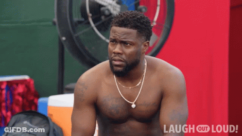 Shirtless Man Standing In Front Of Laugh Out Loud Logo GIF