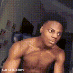 Shirtless Man Standing In Front Of Mirror In Bedroom GIF
