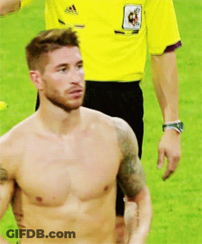Shirtless Man Standing On Field With Referee GIF