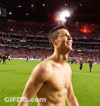 Shirtless Man Standing On Soccer Field GIF