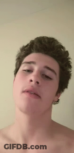 Shirtless Man Taking Selfie Eyes Closed GIF