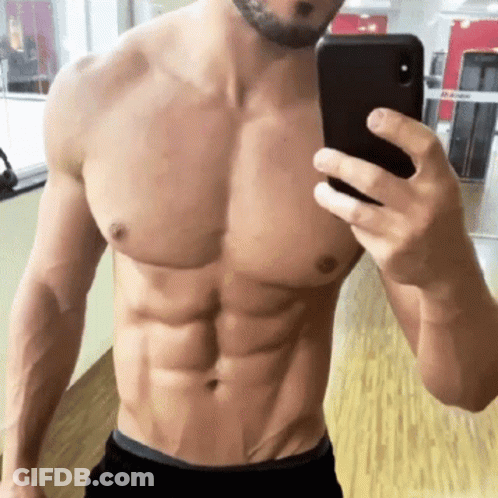 Shirtless Man Taking Selfie In Gym GIF