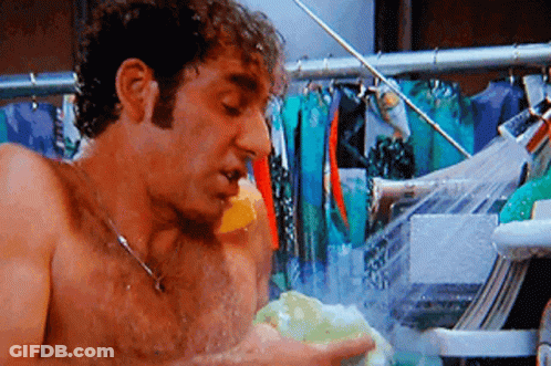 Shirtless Man Taking Shower Holding Sponge GIF