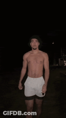 Shirtless Man Wearing Hat And Shorts GIF