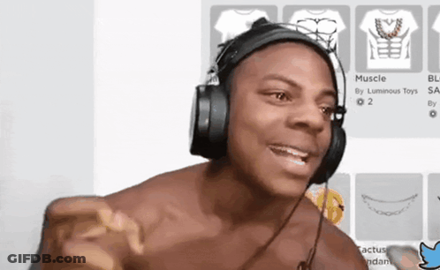 Shirtless Man Wearing Headphones Pointing GIF