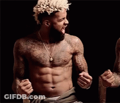 Shirtless Man With Beard And Necklace Screaming GIF