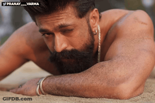 Shirtless Man With Beard Laying In Sand #Pranay_varma GIF