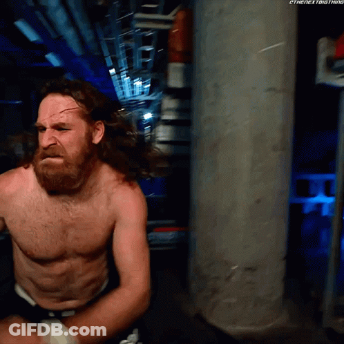 Shirtless Man With Beard 'Next Thing' On Wall GIF