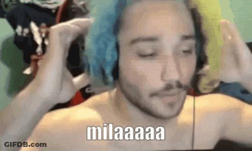 Shirtless Man With Blue Hair And Headphones Making Funny Face GIF