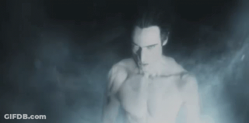 Shirtless Man With Chest Smoke In Dark Room GIF