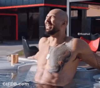 Shirtless Man With Chest Tattoo In Hot Tub GIF