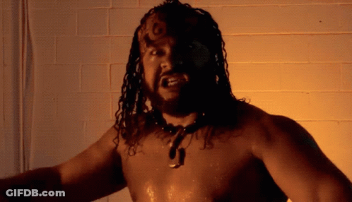 Shirtless Man With Dreadlocks And J Necklace GIF