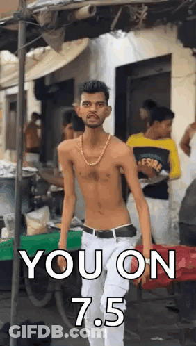 Shirtless Man With Gold Chain At Street Vendor GIF