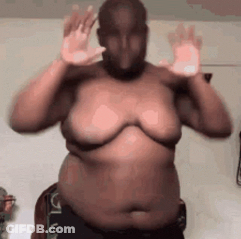 Shirtless Man With Huge Breasts GIF