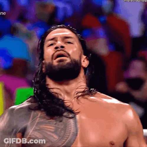 Shirtless Man With Long Hair And Beard In Crowd GIF