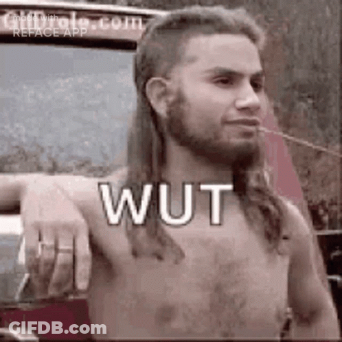 Shirtless Man With Mullet And Beard Standing In Front Of Car GIF