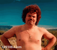 Shirtless Man With Mustache And Cross Necklace Hands On Hips GIF