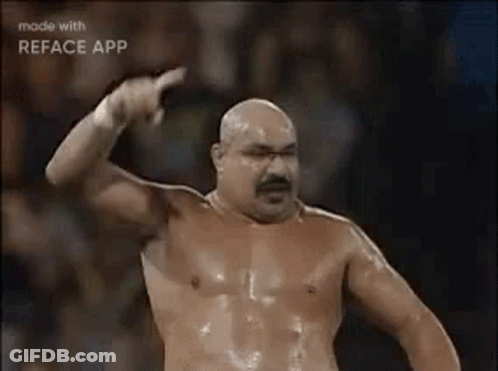 Shirtless Man With Mustache Pointing At Camera GIF