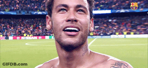 Shirtless Man With Neck Tattoo Smiling On Soccer Field GIF