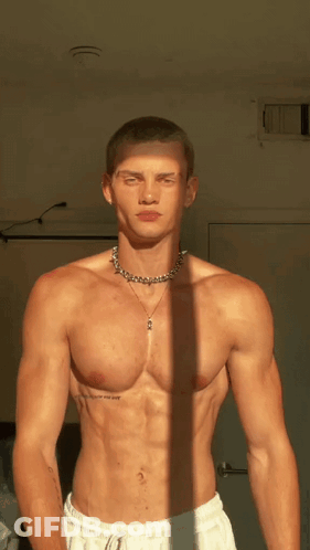 Shirtless Man With Necklace And I Love You Tattoo GIF